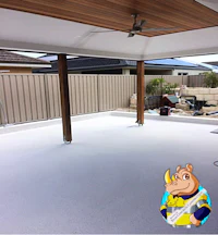 a white patio with a giraffe on it